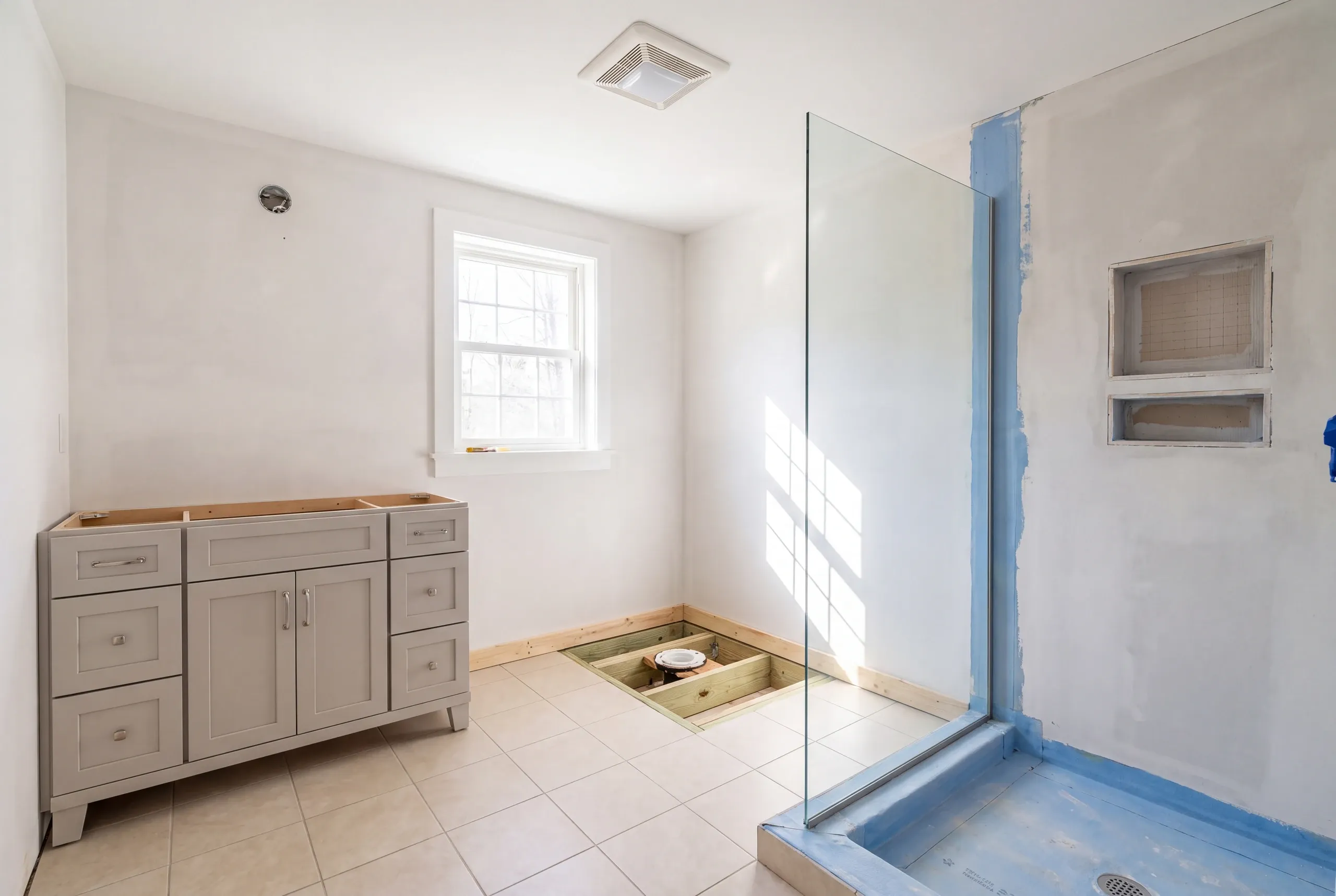 Bathroom remodeling in Warren, ME replacing rotted subfloor at a toilet flange